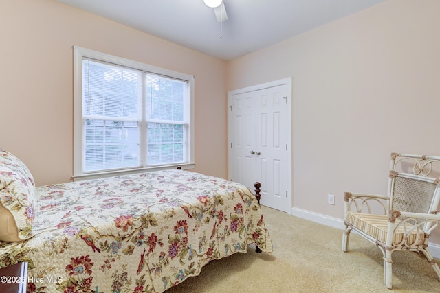 203 Abbey Ln, Wilmington, NC 28411 - bedroom with light carpet, a closet, baseboards, and ceiling fan