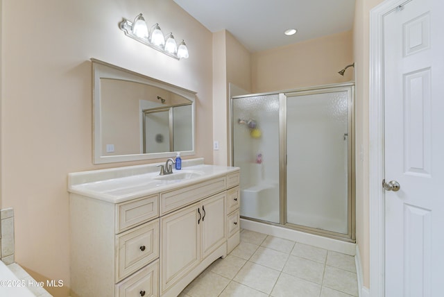 203 Abbey Ln, Wilmington, NC 28411 - full bathroom featuring tile patterned flooring, a stall shower, and vanity