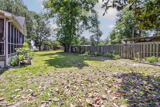 203 Abbey Ln, Wilmington, NC 28411 - view of yard with a sunroom