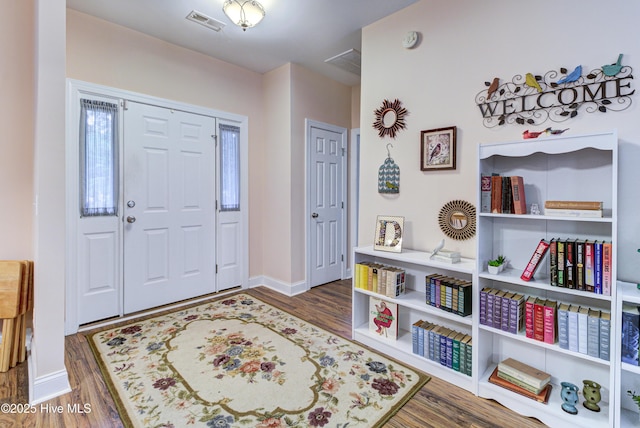 203 Abbey Ln, Wilmington, NC 28411 - entryway featuring wood finished floors and baseboards
