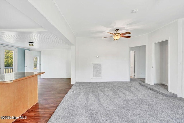 159 Shady Lane Rd, Willard, NC 28478 - unfurnished living room with a ceiling fan, baseboards, and dark wood-style flooring