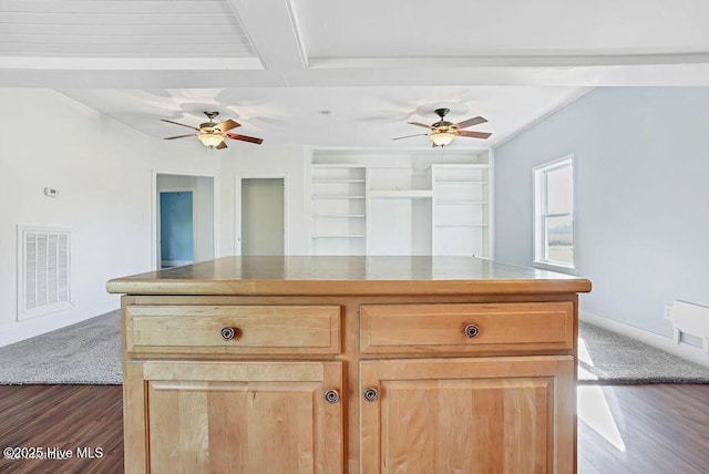 159 Shady Lane Rd, Willard, NC 28478 - kitchen featuring dark wood-style floors, ceiling fan, light brown cabinets, baseboards, and beam ceiling