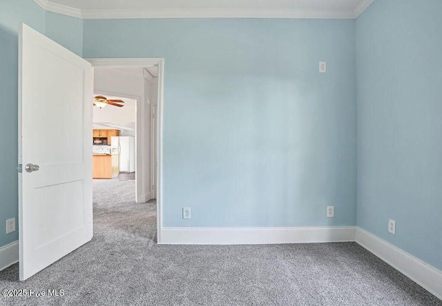 159 Shady Lane Rd, Willard, NC 28478 - unfurnished room with carpet flooring, crown molding, baseboards, and ceiling fan