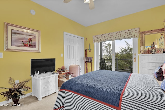 53 N Ridge Ln, Surf City, NC 28445 - carpeted bedroom featuring access to outside, a ceiling fan, and a closet