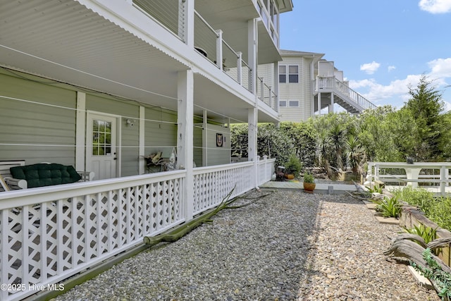 53 N Ridge Ln, Surf City, NC 28445 - view of property exterior featuring covered porch
