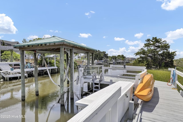 53 N Ridge Ln, Surf City, NC 28445 - dock area featuring a water view and boat lift