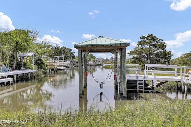 53 N Ridge Ln, Surf City, NC 28445 - dock with a water view and boat lift