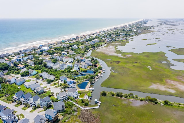 53 N Ridge Ln, Surf City, NC 28445 - aerial view of property and surrounding area featuring unending shoreline and nearby suburban area