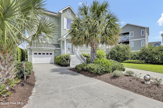 53 N Ridge Ln, Surf City, NC 28445 - view of front of home featuring driveway and a garage
