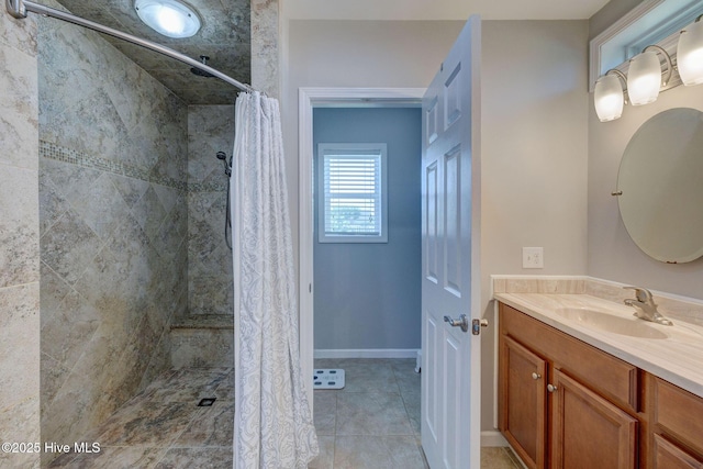 176 Lewis Rd, Hampstead, NC 28443 - full bath with vanity, tiled shower, and tile patterned flooring