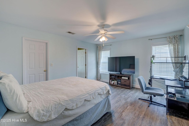 176 Lewis Rd, Hampstead, NC 28443 - bedroom with wood finished floors, baseboards, and ceiling fan
