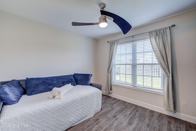 176 Lewis Rd, Hampstead, NC 28443 - bedroom featuring baseboards, wood finished floors, and a ceiling fan