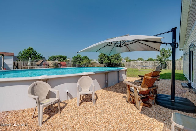 176 Lewis Rd, Hampstead, NC 28443 - view of pool with a fenced backyard