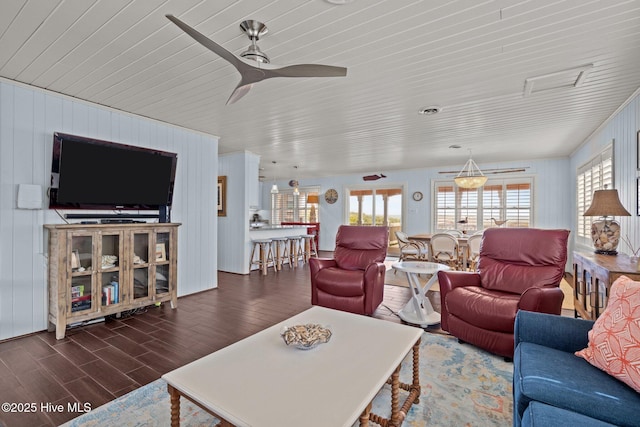5709 Ocean Dr, Emerald Isle, NC 28594 - living area with wood finished floors, wooden ceiling, ceiling fan, and wooden walls