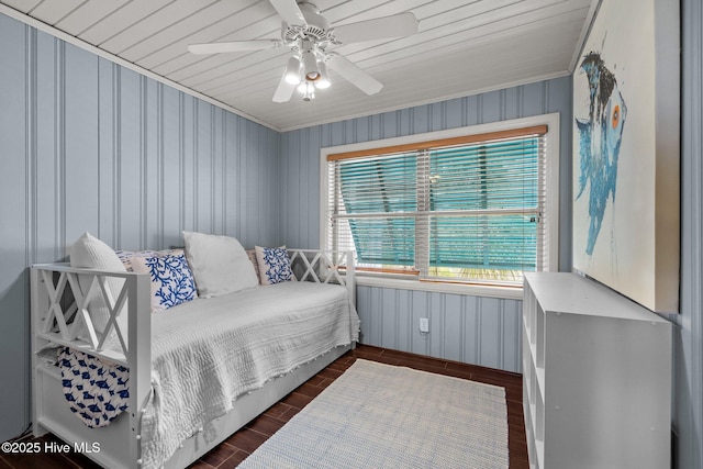 5709 Ocean Dr, Emerald Isle, NC 28594 - bedroom with dark wood-style floors and a ceiling fan