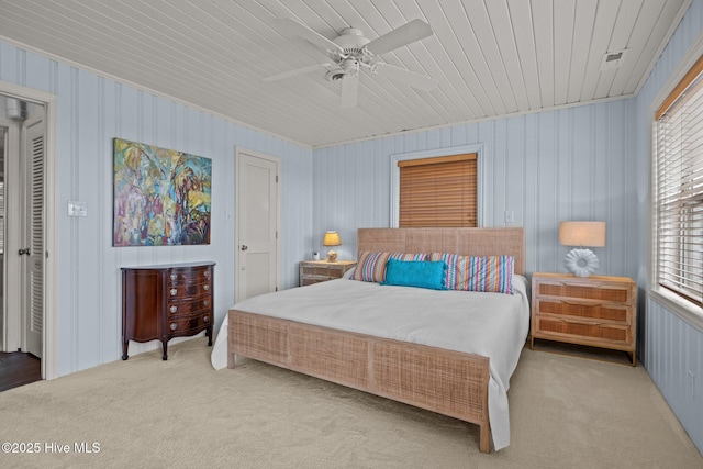 5709 Ocean Dr, Emerald Isle, NC 28594 - carpeted bedroom featuring wooden ceiling and a ceiling fan