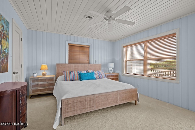 5709 Ocean Dr, Emerald Isle, NC 28594 - bedroom with carpet flooring, wood ceiling, and a ceiling fan