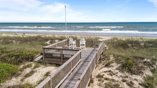 5709 Ocean Dr, Emerald Isle, NC 28594 - surrounding community with a beach view and a deck with water view