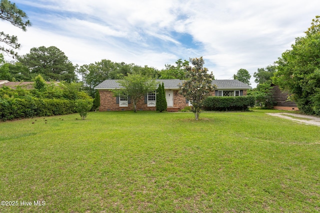 514 Mohican Trl, Wilmington, NC 28409 - ranch-style house featuring a front lawn