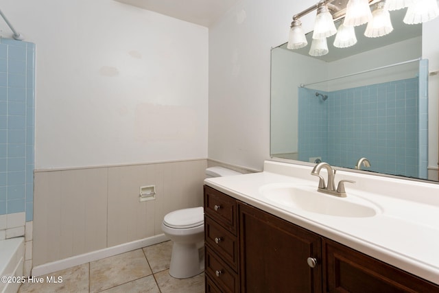 514 Mohican Trl, Wilmington, NC 28409 - bathroom featuring toilet, wainscoting, vanity, tile patterned floors, and a chandelier