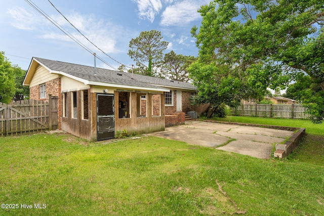 514 Mohican Trl, Wilmington, NC 28409 - back of property with a patio area and brick siding
