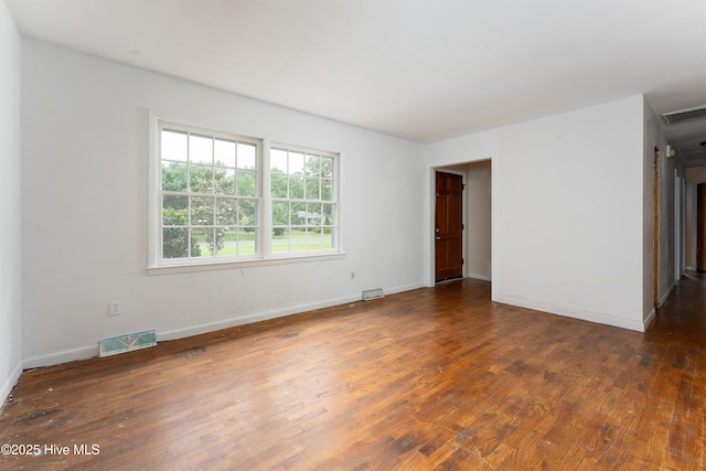 514 Mohican Trl, Wilmington, NC 28409 - empty room with wood finished floors and baseboards