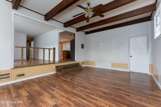 514 Mohican Trl, Wilmington, NC 28409 - empty room with wood finished floors, beamed ceiling, ceiling fan, and baseboards