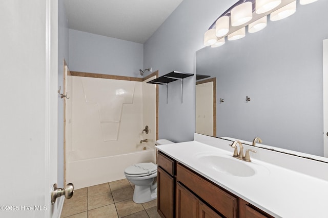 full bath featuring toilet, tile patterned floors, vanity, and tub / shower combination