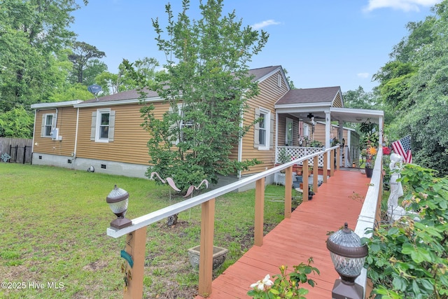 2601 Mayberry Loop Rd, Morehead City, NC 28557 - porch featuring a lawn and ceiling fan