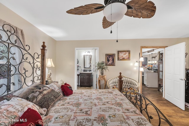 2601 Mayberry Loop Rd, Morehead City, NC 28557 - bedroom featuring wood finished floors, ensuite bathroom, and ceiling fan