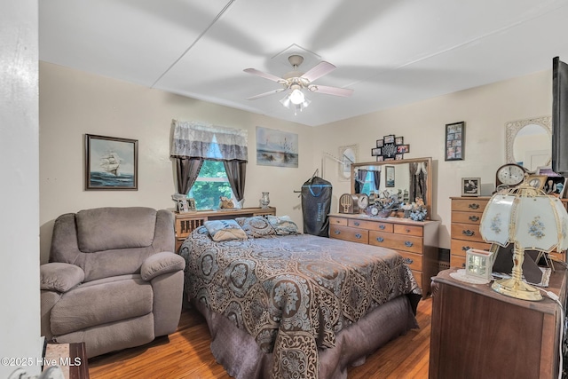 2601 Mayberry Loop Rd, Morehead City, NC 28557 - bedroom featuring wood finished floors and a ceiling fan