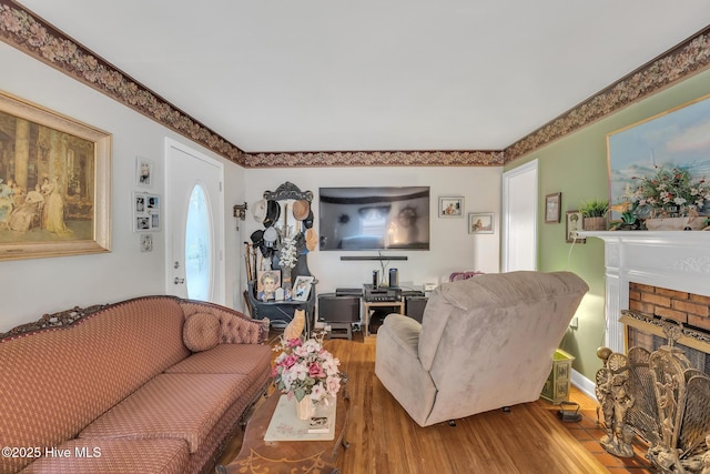 2601 Mayberry Loop Rd, Morehead City, NC 28557 - living room with wood finished floors and a brick fireplace