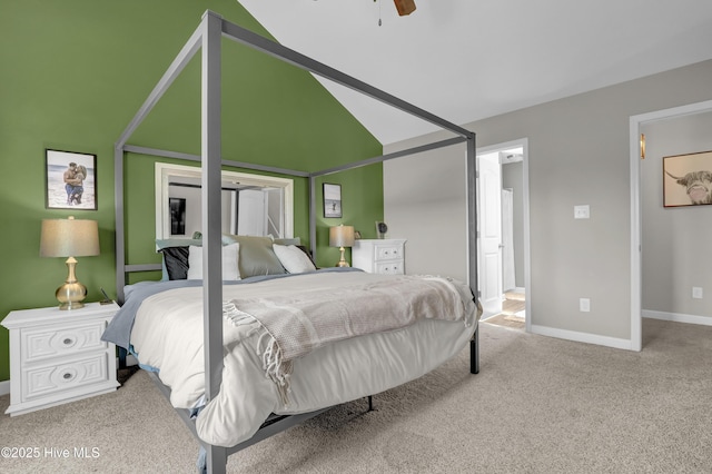 bedroom with carpet, baseboards, vaulted ceiling, and ceiling fan