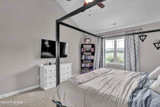carpeted bedroom with lofted ceiling, baseboards, and a ceiling fan
