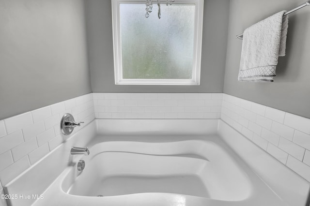 bathroom featuring a bath