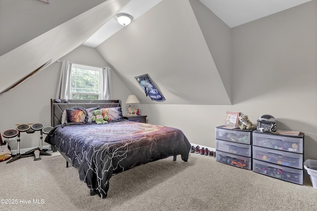 carpeted bedroom featuring vaulted ceiling