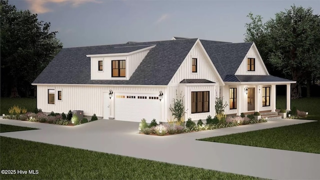 9 Mashie Ct SW, Carolina Shores, NC 28467 - modern farmhouse with concrete driveway, a standing seam roof, metal roof, an attached garage, and a front yard
