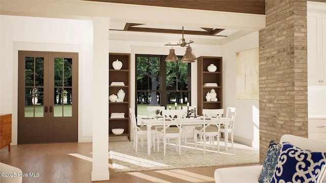 9 Mashie Ct SW, Carolina Shores, NC 28467 - dining room with french doors, wood finished floors, and beamed ceiling