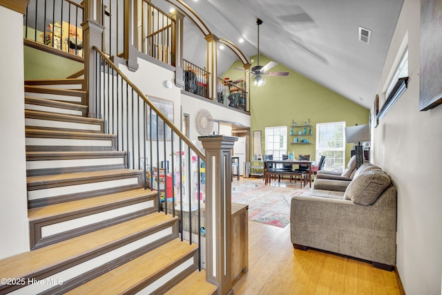3446 Constable Way, Wilmington, NC 28405 - stairs featuring high vaulted ceiling, a ceiling fan, and wood finished floors