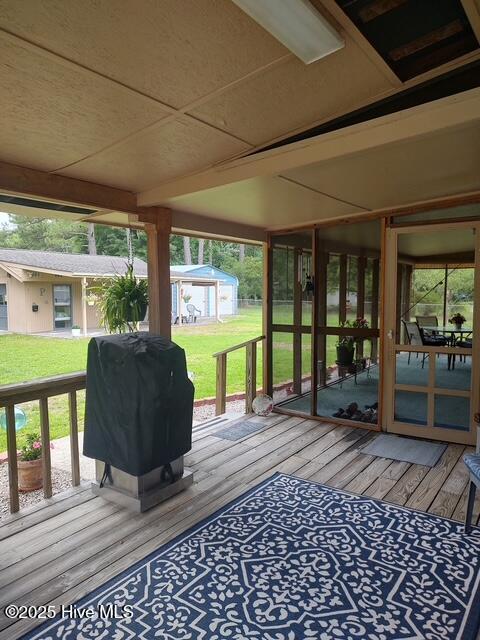115 Oak Hills Dr, Rocky Point, NC 28457 - wooden terrace with an outdoor structure, area for grilling, and a yard