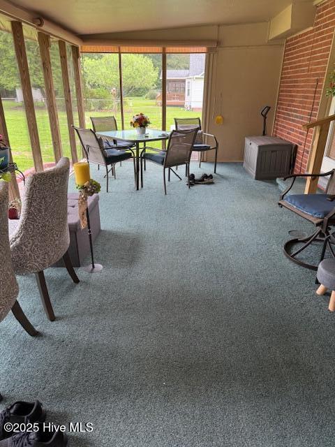 115 Oak Hills Dr, Rocky Point, NC 28457 - sunroom with outdoor dining area