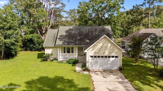 6112 Horton Rd, Oriental, NC 28571 - view of front facade with covered porch, a front yard, concrete driveway, and roof with shingles