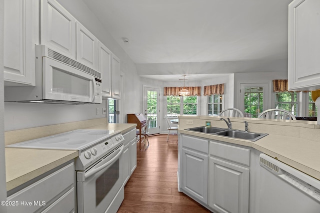 6112 Horton Rd, Oriental, NC 28571 - kitchen with white appliances, a sink, dark wood-type flooring, and light countertops