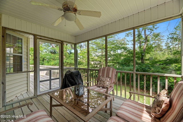 6112 Horton Rd, Oriental, NC 28571 - sunroom / solarium featuring a ceiling fan and view of scattered trees