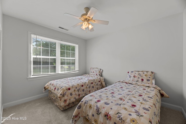 6112 Horton Rd, Oriental, NC 28571 - bedroom with carpet flooring, baseboards, and a ceiling fan