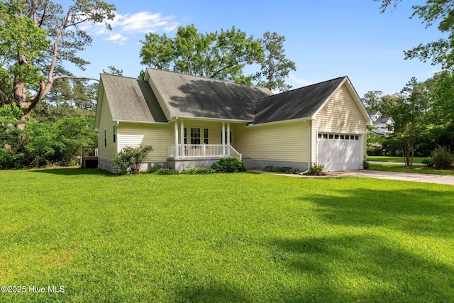 6112 Horton Rd, Oriental, NC 28571 - view of front of home featuring covered porch, an attached garage, a front yard, and a shingled roof