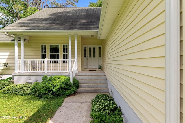 6112 Horton Rd, Oriental, NC 28571 - entrance to property with a shingled roof and covered porch