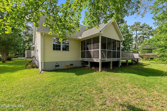 6112 Horton Rd, Oriental, NC 28571 - rear view of house with central AC unit, crawl space, roof with shingles, a yard, and a sunroom