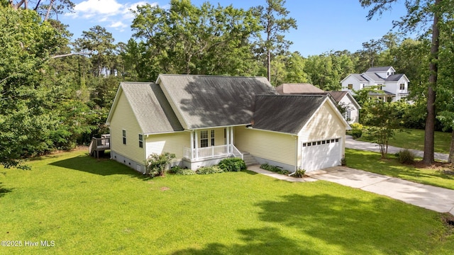 6112 Horton Rd, Oriental, NC 28571 - view of front facade featuring a shingled roof, covered porch, an attached garage, a front yard, and driveway