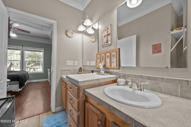 270 N Jenkins St, Holly Ridge, NC 28445 - bathroom featuring ornamental molding, a ceiling fan, vanity, ensuite bath, and tile patterned flooring